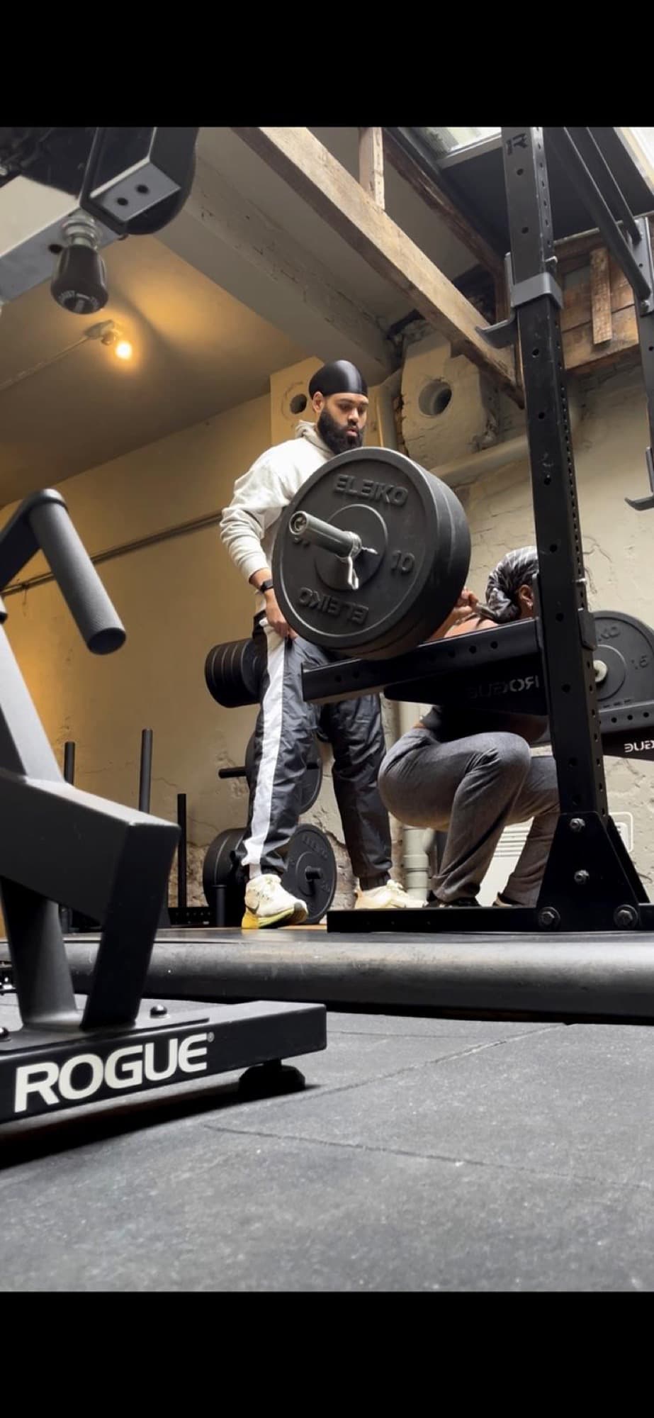 Personal training session with barbell at SculptClub